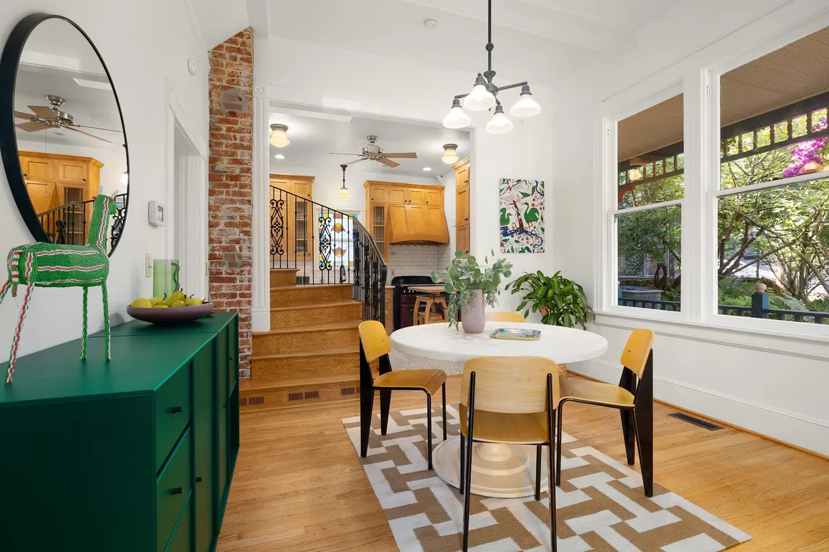 Dining nook with green sideboard