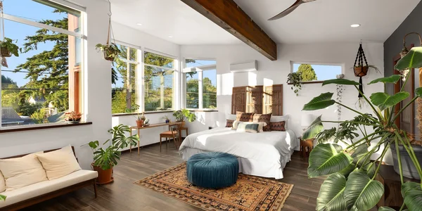 Sunlit bedroom with plants and character